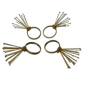 MCM Gold Tone Starburst Napkin Rings Set of 4